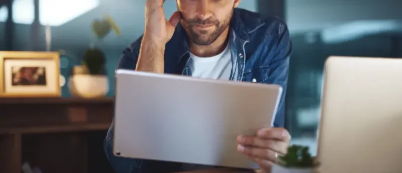 Person overwhelmed by screen time reflecting signs of internet addiction